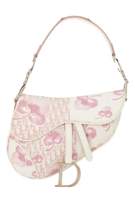 dior pink canvas saddle bag.